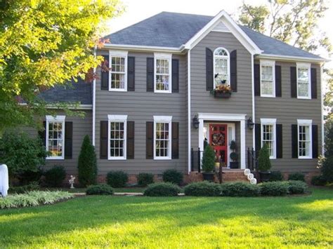 grey houses with black shutters